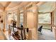 Bright sun room with hardwood floors, lots of windows and a peaceful porch view at 8070 Georgetown Cir, Suwanee, GA 30024