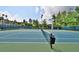 Well maintained tennis court and score board in an amazing community at 8070 Georgetown Cir, Suwanee, GA 30024