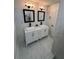 Modern bathroom with double sinks, sleek fixtures, and luxurious finishes at 2022 Detroit Ave, Atlanta, GA 30314