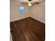 Bright bedroom featuring hardwood floors, a ceiling fan, and a window for ample natural light at 2022 Detroit Ave, Atlanta, GA 30314