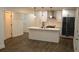 Modern kitchen with white cabinets, an island, and updated stainless steel appliances at 2022 Detroit Ave, Atlanta, GA 30314