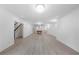 Spacious finished basement with recessed lighting, stairs, and a pool table at 5395 Lacosta Ln, Alpharetta, GA 30022