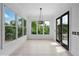 Bright breakfast nook features views of the backyard and provides access to the outdoor living space at 5395 Lacosta Ln, Alpharetta, GA 30022