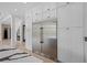 A modern kitchen with stainless steel appliances and custom white cabinetry at 5395 Lacosta Ln, Alpharetta, GA 30022