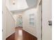 Bright foyer with hardwood floors, and staircase, providing an elegant entrance to the home at 5510 Weddington Dr, Cumming, GA 30040