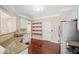 Modern kitchen featuring granite countertops, stainless steel appliances, and ample cabinet space at 5510 Weddington Dr, Cumming, GA 30040