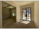 Bright living room featuring a large black-framed window at 4435 Pebble Rock Dr, Cumming, GA 30041