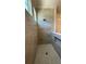 This luxurious shower features floor-to-ceiling tile and a built-in shower niche at 4435 Pebble Rock Dr, Cumming, GA 30041