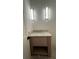 Bathroom vanity with granite countertop and stylish lighting at 4435 Pebble Rock Dr, Cumming, GA 30041