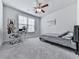 Bedroom with a ceiling fan, study desk, and bed at 449 Carmichael Cir, Canton, GA 30115