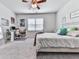 Bright bedroom with large window, ceiling fan, and desk creates an inviting space at 449 Carmichael Cir, Canton, GA 30115