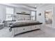 Spacious bedroom features a large bed with storage drawers and ensuite bathroom entrance at 449 Carmichael Cir, Canton, GA 30115