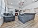 Inviting living area with vaulted ceilings, a fireplace, and generous seating options at 449 Carmichael Cir, Canton, GA 30115