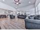 Expansive open-concept living area that flows seamlessly into the kitchen and dining spaces at 449 Carmichael Cir, Canton, GA 30115
