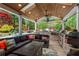 Outdoor living at its finest featuring an outdoor kitchen, bar, and seating area at 904 Beaumont Ct, Canton, GA 30114