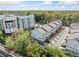 An aerial view showcasing the property with mature trees surrounding the townhome complex at 1388 La France Ne St, Atlanta, GA 30307
