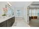 Elegant bathroom featuring double vanity, soaking tub, and lots of natural light at 1388 La France Ne St, Atlanta, GA 30307