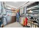 Spacious walk-in closet boasts custom shelving, hanging rods, and drawer units for optimal storage at 1388 La France Ne St, Atlanta, GA 30307