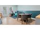 A cozy dining area with table and chairs, plus workout equipment for convenient home fitness at 1388 La France Ne St, Atlanta, GA 30307