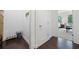 Hallway features a pet station and a glimpse into the bedroom/office space bathed in natural light at 1388 La France Ne St, Atlanta, GA 30307