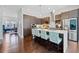 Modern kitchen boasts a large island with seating, stainless appliances, and sleek cabinetry at 1388 La France Ne St, Atlanta, GA 30307