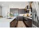 Contemporary kitchen featuring stainless steel appliances, a large island, and modern cabinetry at 1388 La France Ne St, Atlanta, GA 30307