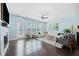 Bright living room with hardwood floors, a fireplace, and plenty of natural light at 1388 La France Ne St, Atlanta, GA 30307