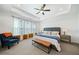 Comfortable main bedroom featuring a bed, sitting area, and soft natural light at 1388 La France Ne St, Atlanta, GA 30307