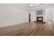 Bright living room featuring a fireplace and hardwood floors at 488 Takely Dr, Lawrenceville, GA 30046