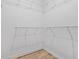 Light and airy walk-in closet with adjustable white wire shelving for custom storage solutions at 488 Takely Dr, Lawrenceville, GA 30046