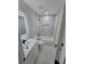 Newly remodeled bathroom showcasing marble wall tile, and modern fixtures at 1427 Lorenzo Sw Dr, Atlanta, GA 30310