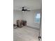 Contemporary bedroom with wood floor, a modern ceiling fan, and a view to the outside at 1427 Lorenzo Sw Dr, Atlanta, GA 30310