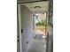 Inviting entryway with stylish light fixture, leading into a well-lit and newly updated home interior at 1427 Lorenzo Sw Dr, Atlanta, GA 30310