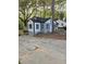 Charming remodeled home with a gray exterior, black trim, and well-kept front yard, offering curb appeal at 1427 Lorenzo Sw Dr, Atlanta, GA 30310