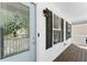 Exterior view of a front door with decorative glass and black window shutters at 208 Julia Lynn Ln, Acworth, GA 30102