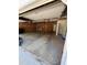 View of an empty two car garage ready for storage, parking, and other projects at 208 Julia Lynn Ln, Acworth, GA 30102