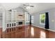 Spacious living room with vaulted ceiling, fireplace, built-in cabinets, and hardwood floors at 208 Julia Lynn Ln, Acworth, GA 30102