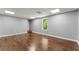 The room features a bright window and sleek, modern flooring at 208 Julia Lynn Ln, Acworth, GA 30102