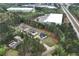 Aerial shot showcasing new homes nestled within a wooded area, near major highway at 2107 E Maddox Rd, Buford, GA 30519