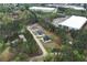 Stunning aerial view of newly built homes surrounded by mature trees and lush greenery at 2107 E Maddox Rd, Buford, GA 30519