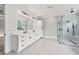Beautiful bathroom with double vanity, marble floors, and glass shower, creating a luxurious and functional space at 2107 E Maddox Rd, Buford, GA 30519