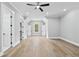Spacious bedroom with hardwood floors and ensuite with multiple closets at 2107 E Maddox Rd, Buford, GA 30519