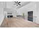 Upper level room includes a wet bar and railing overlooking the floor below at 2107 E Maddox Rd, Buford, GA 30519