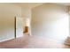 Bedroom with vaulted ceilings, neutral carpet, and natural light at 2396 Bear Mountain St, Lithonia, GA 30058