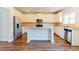 Modern kitchen features granite countertops, stainless steel appliances, and a center island at 2396 Bear Mountain St, Lithonia, GA 30058