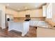 Spacious kitchen with white cabinets, granite countertops, and stainless appliances at 2396 Bear Mountain St, Lithonia, GA 30058