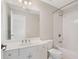 Bathroom features white cabinets, sink, and shower over tub at 295 Langshire Dr, Mcdonough, GA 30253