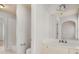 Bathroom features white cabinets, sink, toilet, and shower over tub at 295 Langshire Dr, Mcdonough, GA 30253