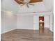 Large bedroom showing hardwood floors and an open door to an adjoining room at 295 Langshire Dr, Mcdonough, GA 30253