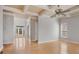 Open living room with coffered ceiling and view of a grand front door at 295 Langshire Dr, Mcdonough, GA 30253